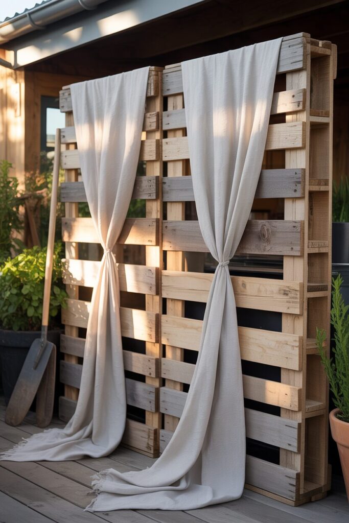 40. Build a Privacy Screen from Pallets and Fabric